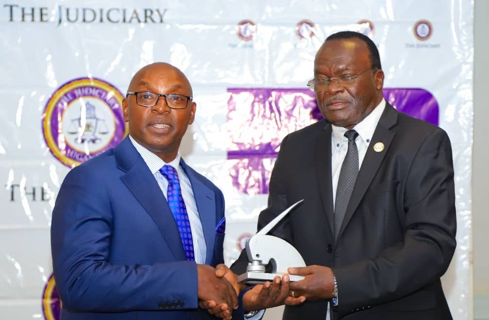 Owiny-Dollo Retires as Chief Justice, Hands Over to Dr Flavian Zeija